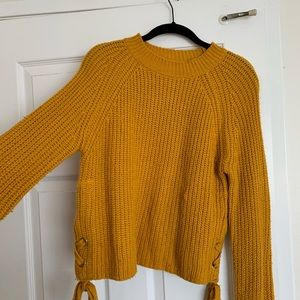 Yellow knitted sweater